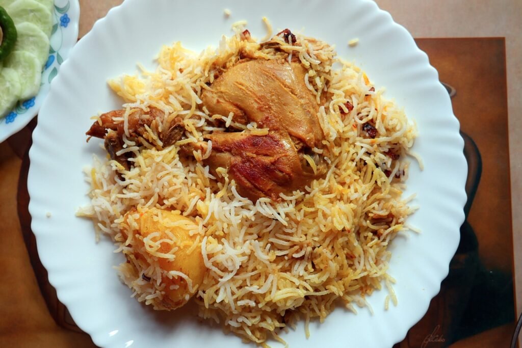 Chicken Biriyani at plate with potatoes, rice and chicken